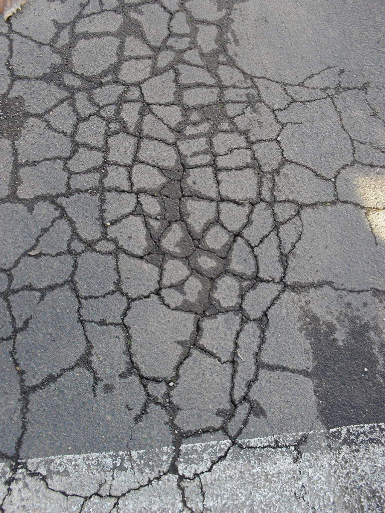 If there are interconnected cracks, you need a driveway replacement
