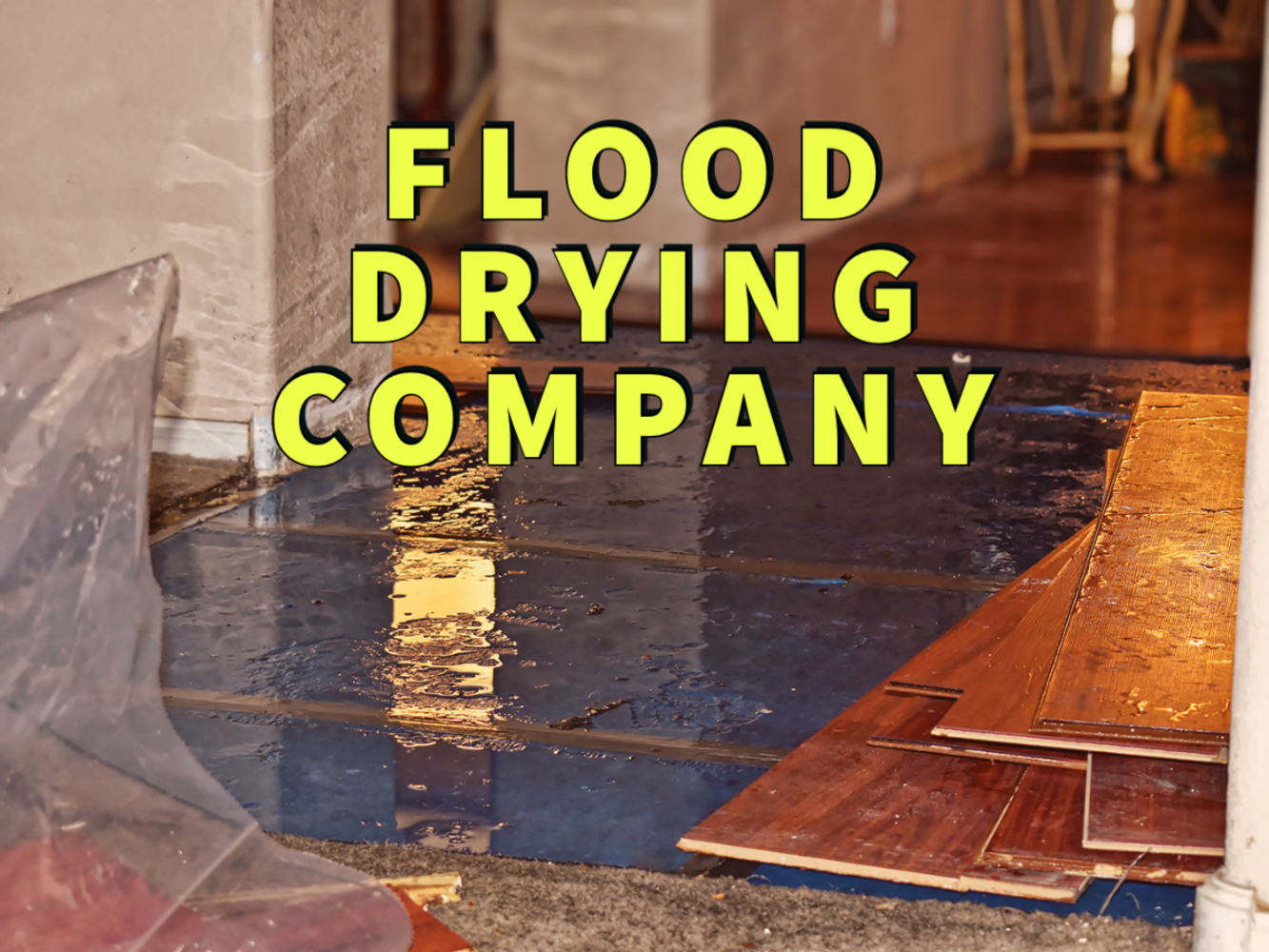 Flood drying company written in yellow over water damaged hardwood floors