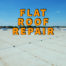 flat roof repair written in orange over beige flat roof with blue sky in the background