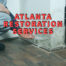 Atlanta restoration services written in red over water-damaged drywall