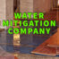 water mitigation company written in green over standing water next to hardwood floorboards